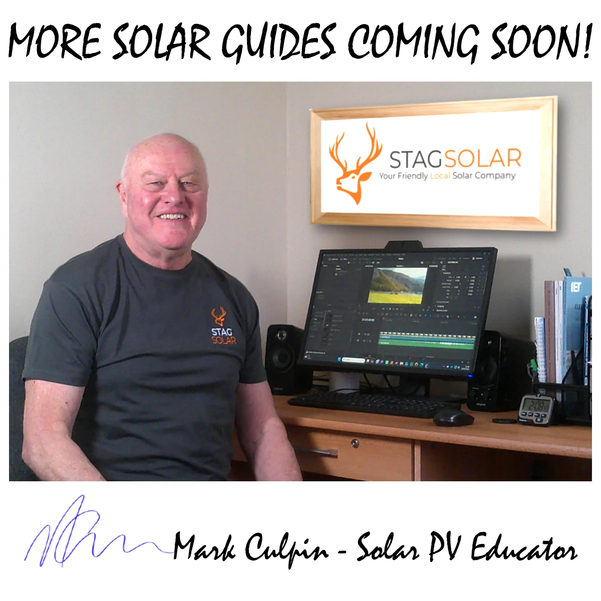 Solar Educator Essex sitting at desk signing off a Solar PV blog post with handwritten signature.
